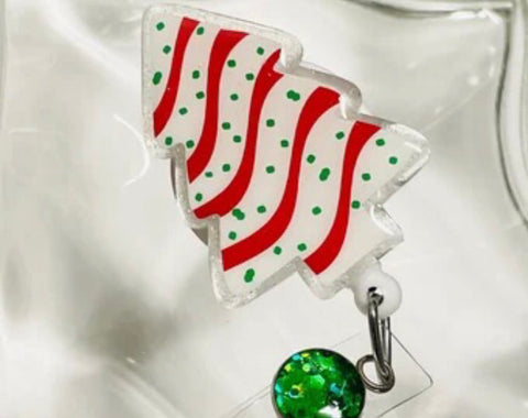 Christmas Tree Cake Badge Reel – Streets of Orleans